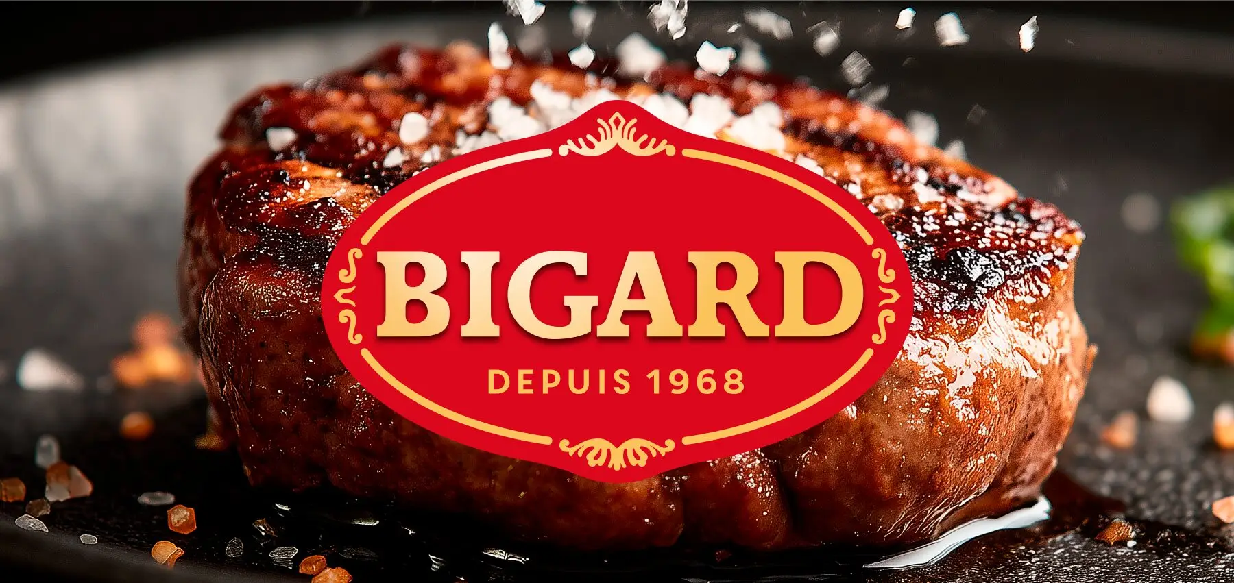 Bigard 'since 1968' logo on a grilled steak sprinkled with sea salt