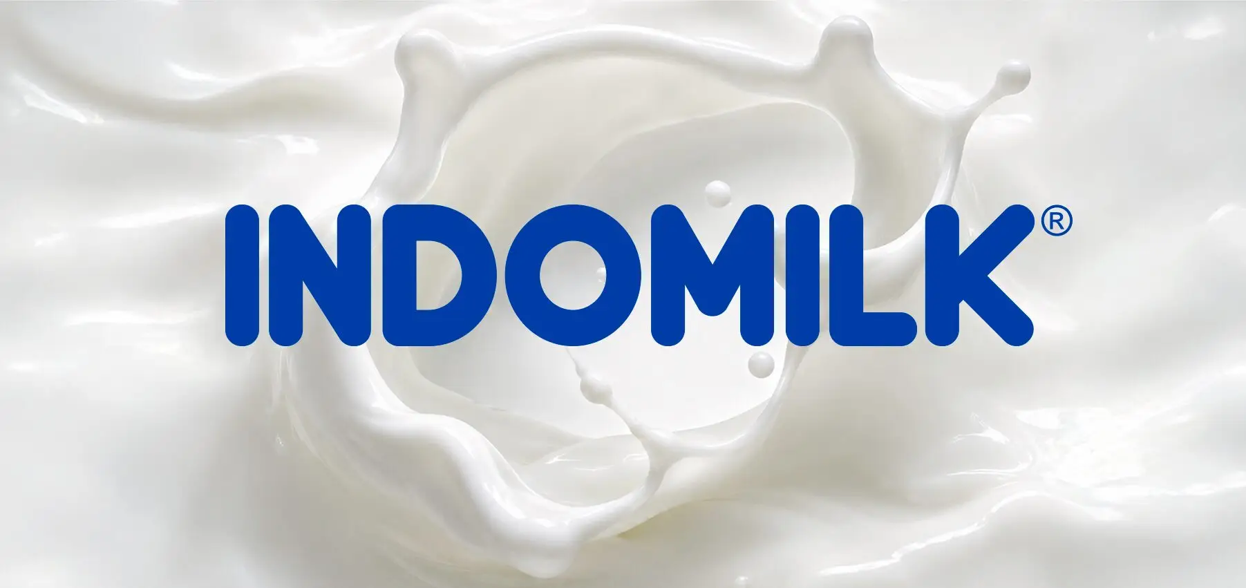 Blue Indomilk logo on a milk splash