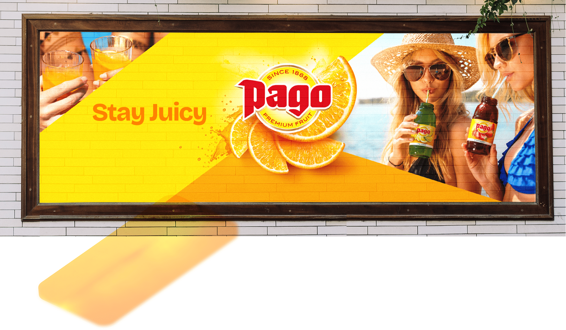 Pago 'Stay Juicy' billboard with young women drinking Pago by the water